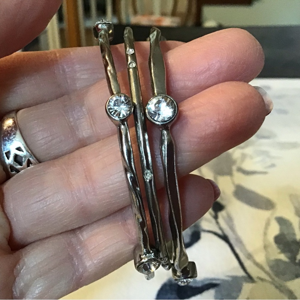 3 silver and rhinestone bangle bracelets. 2 1/2” diameter. Excellent condition